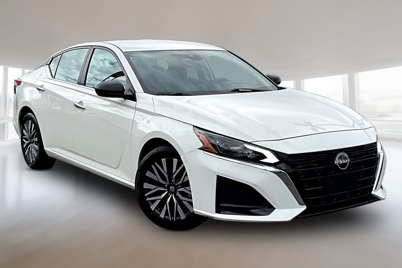 2025 Nissan Altima 2.5 SV in Glacier White — front three-quarter view
