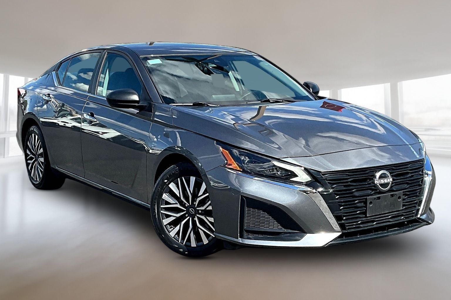 2025 Nissan Altima 2.5 SV in Gun Metallic — front three-quarter view