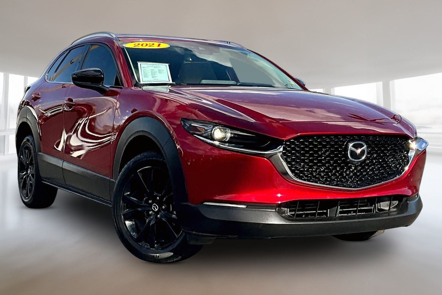 2021 Mazda Mazda CX-30 Turbo in Red Crystal — front three-quarter view