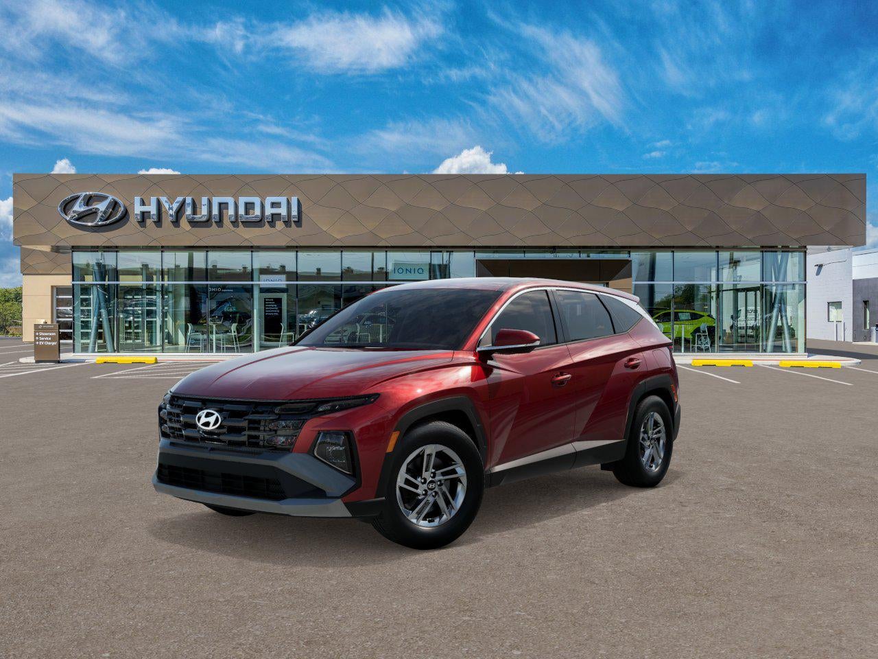2026 Hyundai TUCSON SE AWD in Red — front three-quarter view