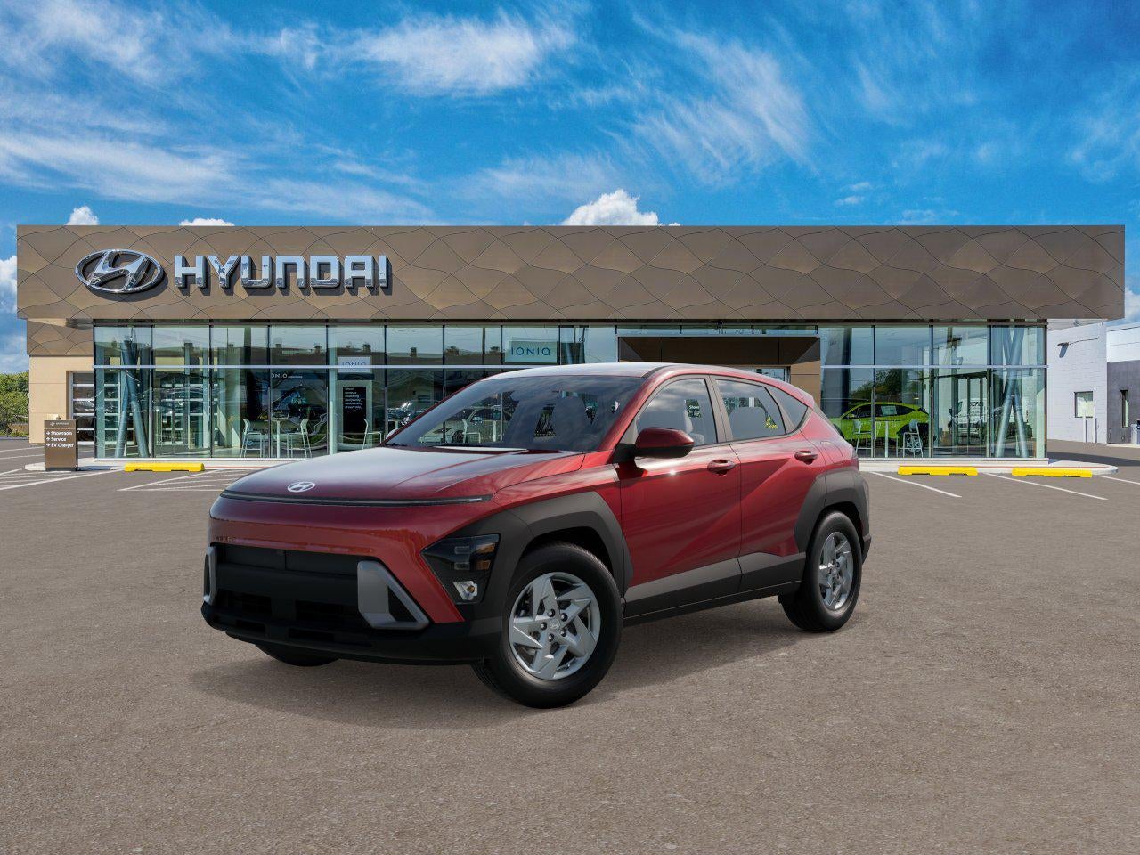 2026 Hyundai KONA SE FWD in Red Metallic — front three-quarter view