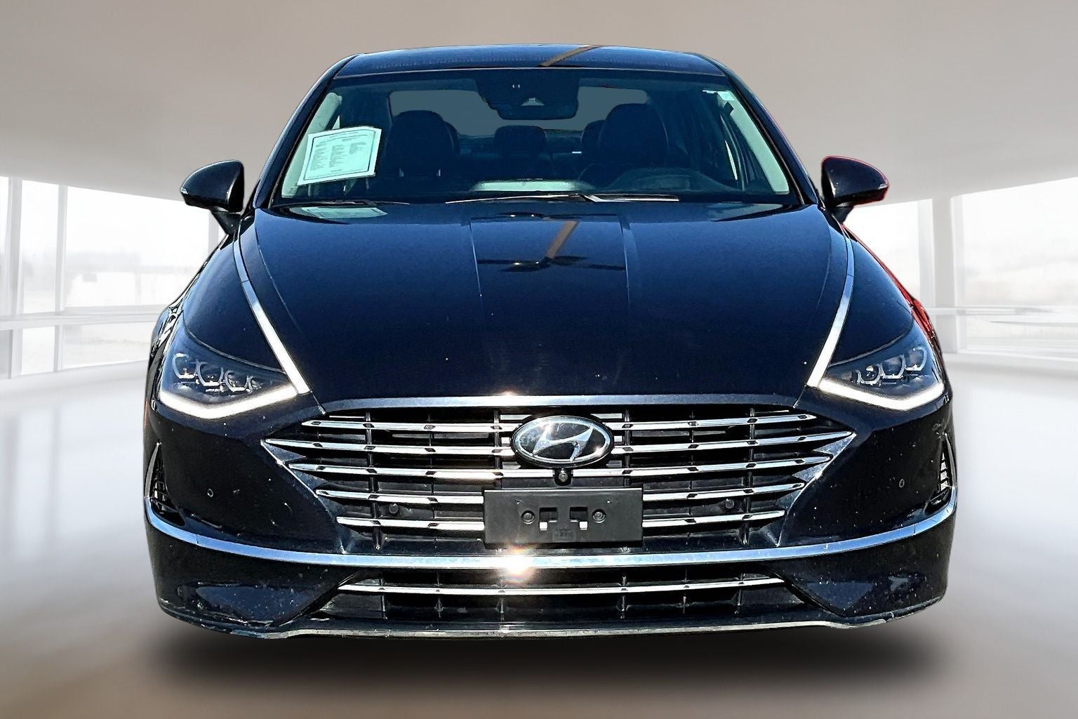 2021 Hyundai SONATA HYBRID Limited in Oxford Blue — front three-quarter view